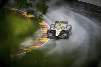 COLTON HERTA (26) of Valencia, California comes through turn 12 (Canada Corner) during a wet