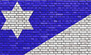 Flag of Branch Davidians painted on brick wall