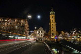 Christmas illuminated Mur bridge, behind Frnziskanerkirche, light trails, night shot, Graz, Styria,