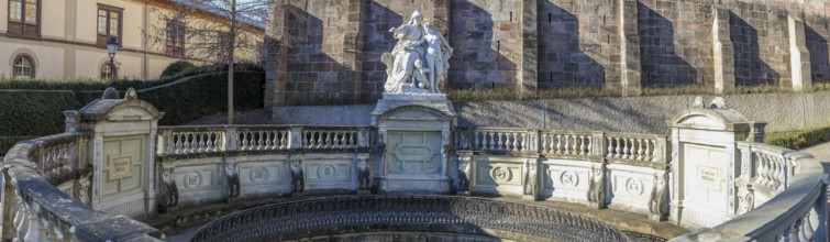 Panoramic photo of the source of the Danube and the Mother Baar figure group in front of the