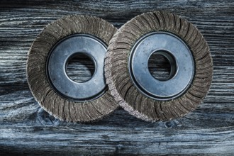 Used polishing flap discs on vintage wooden board