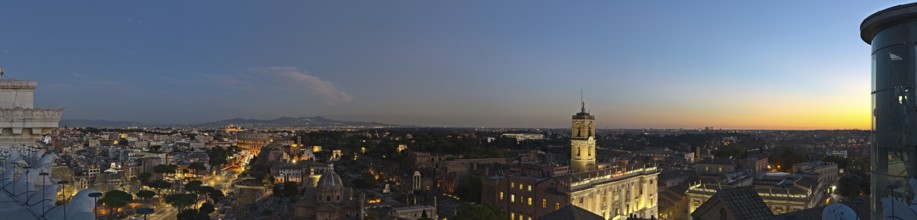 View on the Collosseum from Altare della Patria and the city in a panorama stitch