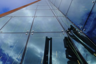 Building in the Hafencity with glass façade, reflection, Hanseatic City of Hamburg, Germany