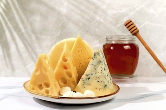 Blue cheese, Roquefort, Parmesan, Mozzarella, Maasdam with honey, Assortment of different types of