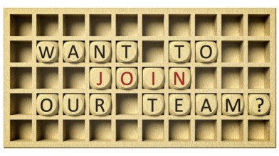 3d rendering of a wooden grid with cubes and the message want to join our team