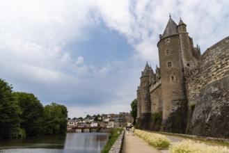 Josselin, France, July 26, 2018: View of the Castle and the river in the medieval town, Brittany