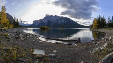 Beautiful autumn landscape scene in lake and mountain in background in west Canada