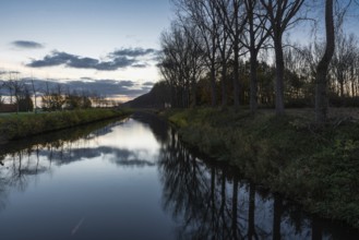 Colorful reflections at the canal near Bruges