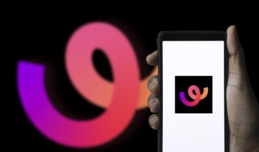 Whee logo is displayed on smartphone. Whee is a new social app owned by ByteDance, TikTok Pte. Ltd.