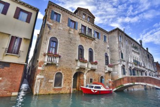 Vintage buildings along the canal in Venice, Italy