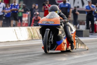 Sep 22, 2023-Concord, NC: NHRA Pro Stock Motorcycles Series driver, Jianna Evaristo, runs down the