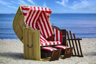 Beach chairs on Timmendorfer Strand on the Baltic sea with blue sky