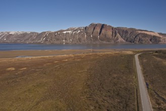 Aerial view of Austertanaveien road 890 in clear summer weather, Varanger Peninsula, Norway