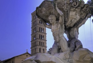 Triton Fountain with bell tower of Santa Maria in Cosmedin, Forum Boarium, Rome Rome, Italy