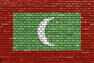 Flag of Maldives painted on brick wall