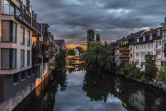 Neurenberg, Bavaria, Germany, 07 26 2018: Historical buildings of old town, reflected in the water
