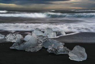 Icebergs from Vatnajokull glacier, drop into Jokulsarlon lake and then to the Ice beach in Iceland.
