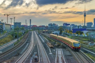 Berlin metro railway tracks with TV Tower in background