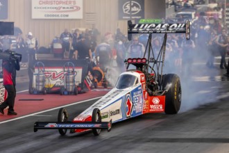 NHRA driver, Antron Brown, prepares to qualify for the Dodge Power Brokers NHRA Mile-High Nationals