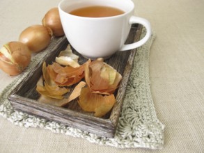 A cup of healthy onion skin tea, tea made from onion skins