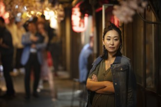 TOKYO, JAPAN - MAY 12, 2019 - People working in bars in Omoide Yokocho or 'Piss Alley' which is a