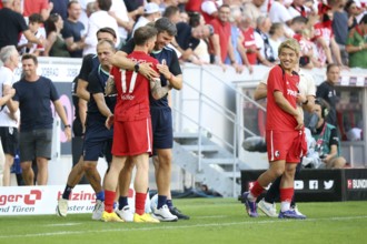 Assistant coach Florian Bruns (SC Freiburg) hugs the two-time goalscorer, goalscorer #f17, Ritsu