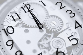 Twelve oclock (midnight or midday) on clock, double exposure