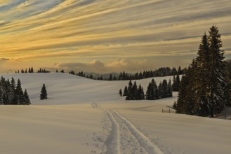 Wonderful sunset with snow and beautiful clouds in Slovakia