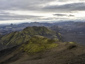 View from Mount Sveinstindur, volcanic landscape, moss-covered hills, mountains, Icelandic