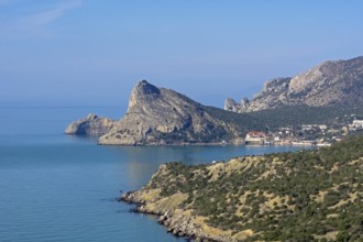 Seascape. View of the resort village Novy Svet from the top of the coastal mountain. Crimea. Sunny