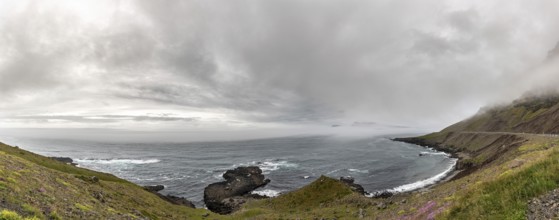 Icelandic Scenery panorama shot at a cloudy day while driving along the Route 1