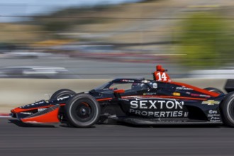 SANTINO FERRUCCI (14) of Woodbury, Connecticut practices for the Firestone Grand Prix of Monterey
