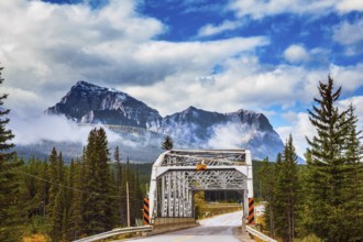 Bridge over the river in the picturesque mountain reserve. Canadian Rocky Mountains, Jasper