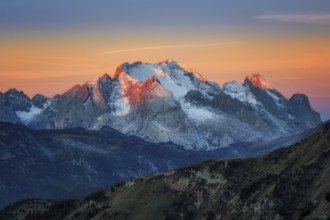 The view from Passo Giau to the Marmolada massif after colour sunrise