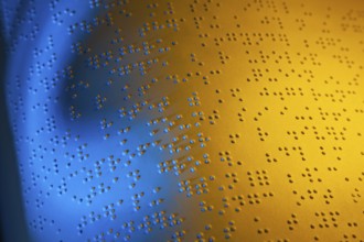 A book written in Braille for the blind. Braille for the blind, A book written in Braille. Braille