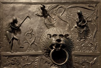 Bernward's door, left wing LIFE OF THE STAMMELTERS and lion as door puller, framed field c.
