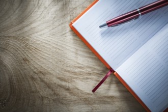 Opened notebook pen top view