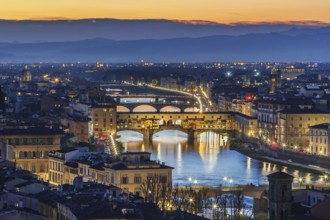 View of Florence with Ponte Vecchio in evening from Michelangelo hill, Italy