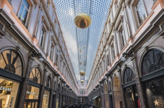 Brussels, Belgium, 12 18 2018: Glass roof and facades of the Saint Hubertus Gallery in Art Nouveau