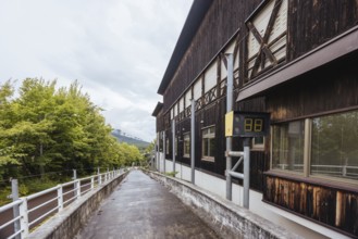 IIZUNA, JAPAN - SEPTEMBER 19, 2024: The now abandoned Nagano 1998 Olympic Spiral luge bobsleigh