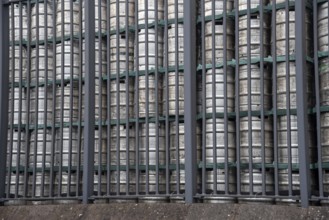 Stack of beer barrels in a brewery factory