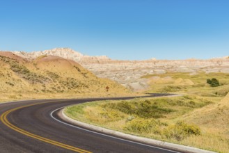 Fascinating colorful hills along the road leading through Badlands National Park, USA