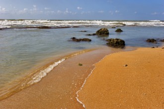 Coast of Mediterranean sea with big stones in water
