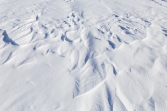 Winter, snowdrift pattern on a frozen river, Province of Quebec, Canada