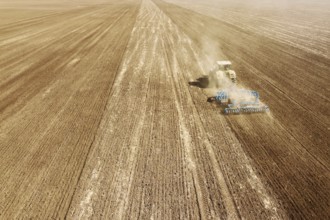 Aerial view Tractor preparing field, Agriculture tractor landscape