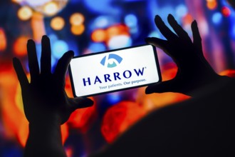 In this photo illustration, the Harrow Health logo is displayed on a smartphone mobile