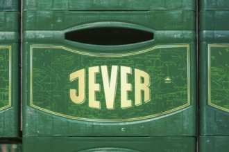 Stacked Jever beer crates in front of the Frisian Brewery, Jever Brewery, Jever, East Frisia, Lower