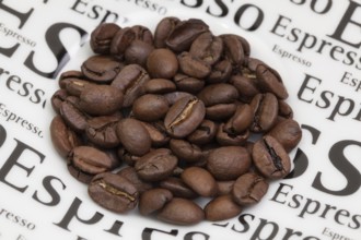 Coffee beans on a coffee saucer