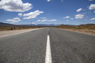 Endlessly straight road in the vastness of Africa