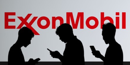 ExxonMobil Corporation Logo on a mobile screen stock image. It's a major multinational publicly